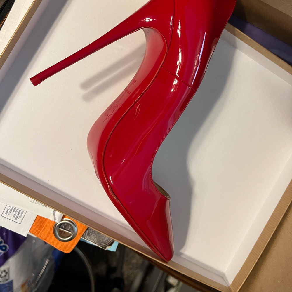 Christian Louboutin pumps New w/box. Tiny flaw wrinkle on the edge of sole